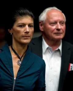 Former co- chairman of German party's Die Linke (The Left Party) Oskar Lafontaine (R) and the party's deputy chairman Sahra Wagenknecht leave for a break during a party meeting in Goettingen on June 2, 2012. New leaders of the party will be elected during the party's annual congress. AFP PHOTO / JOHANNES EISELE